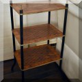 F29. Tiered inlay shelf side table with brass trim. 